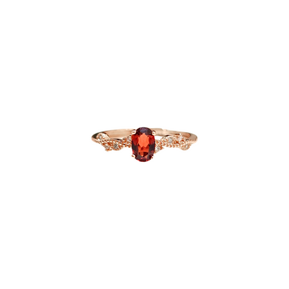 Oval Garnet and Round Zirconia Ring