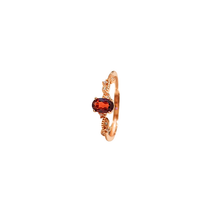 Oval Garnet and Round Zirconia Ring