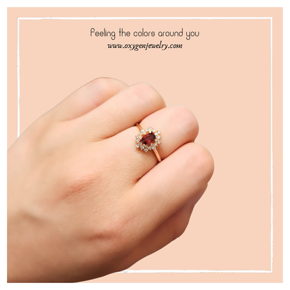 Oval Garnet and Round Zirconia Ring