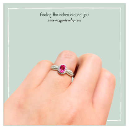 Oval Pink Topaz and Round Zirconia Ring