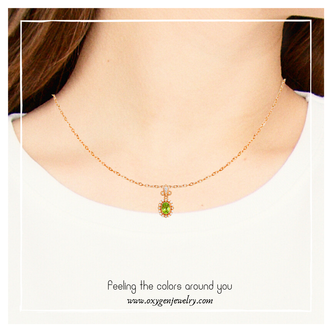 Oval Peridot and Round Zirconia Necklace