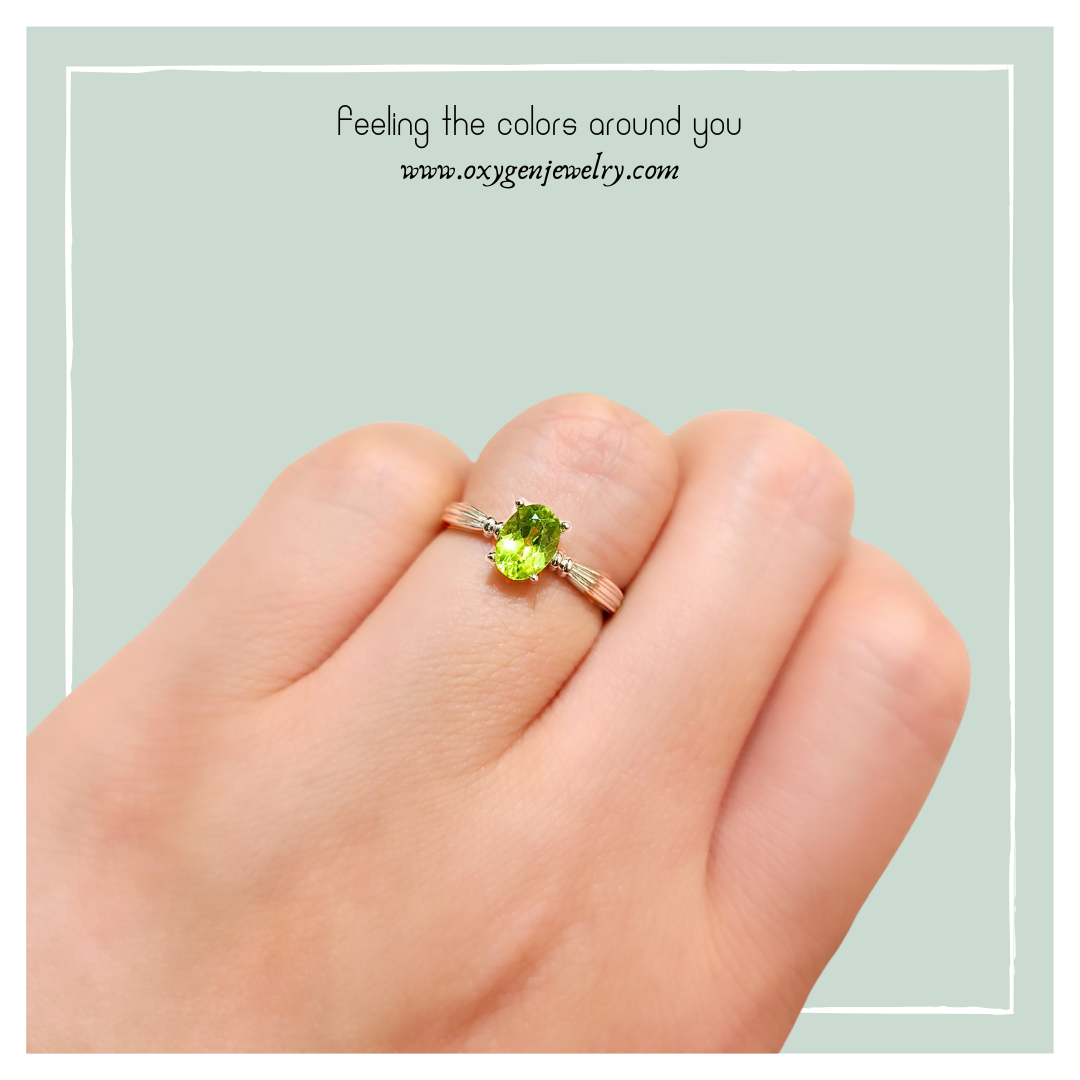 Oval Peridot and Round Zirconia Ring