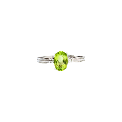 Oval Peridot and Round Zirconia Ring