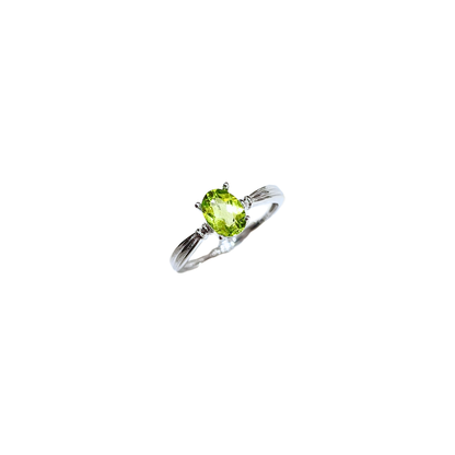 Oval Peridot and Round Zirconia Ring