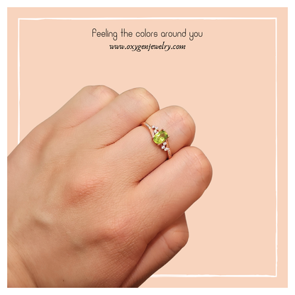 Oval Peridot and Round Zirconia Ring