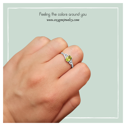 Oval Peridot and Round Zirconia Ring