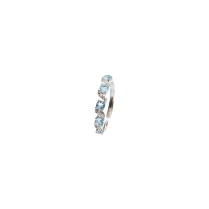 Oval Sky Blue Topaz Ring with Round Zirconia