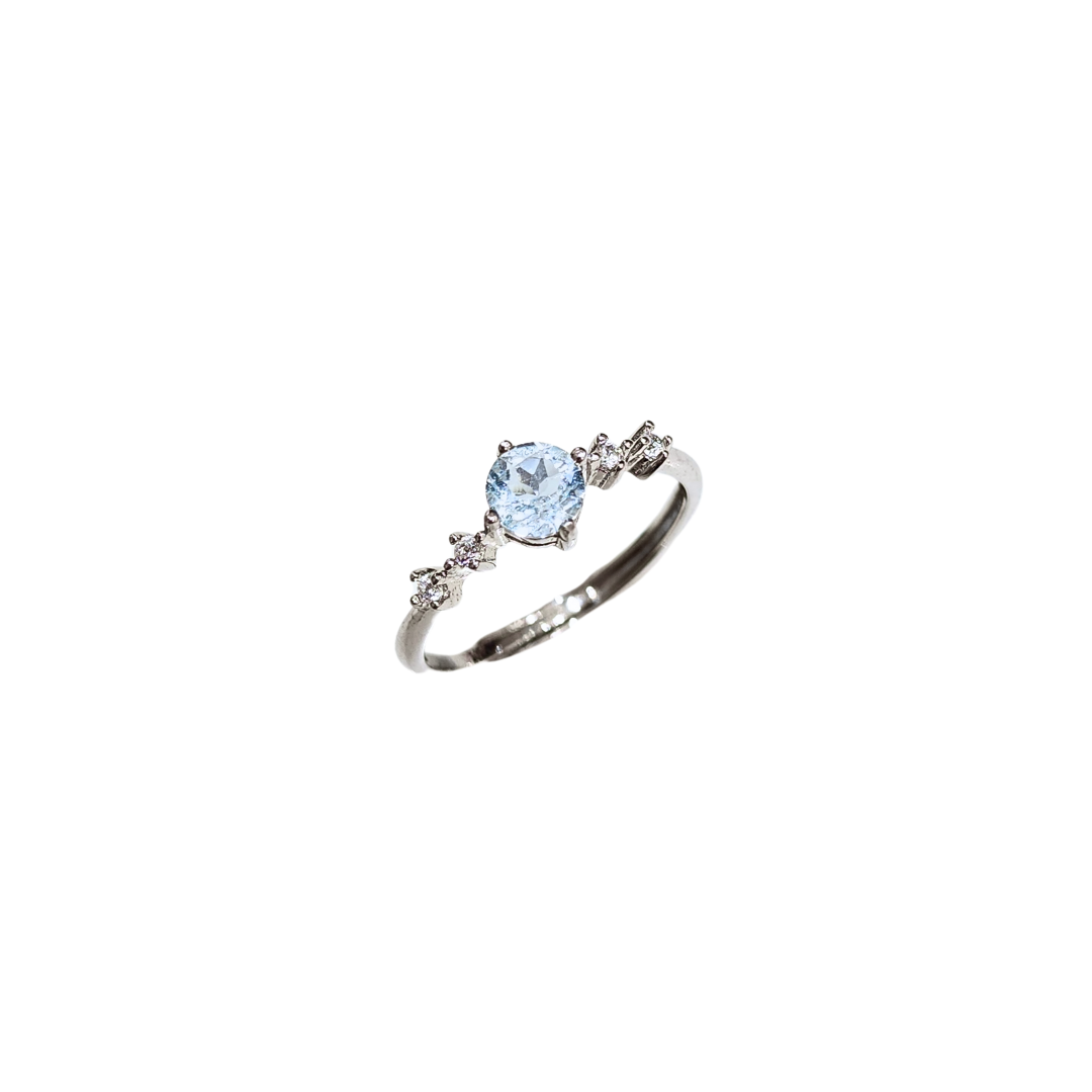 Lucky Clover sky blue topaz four-leaf clover ring