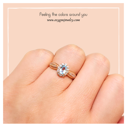 Lucky Clover sky blue topaz four-leaf clover ring