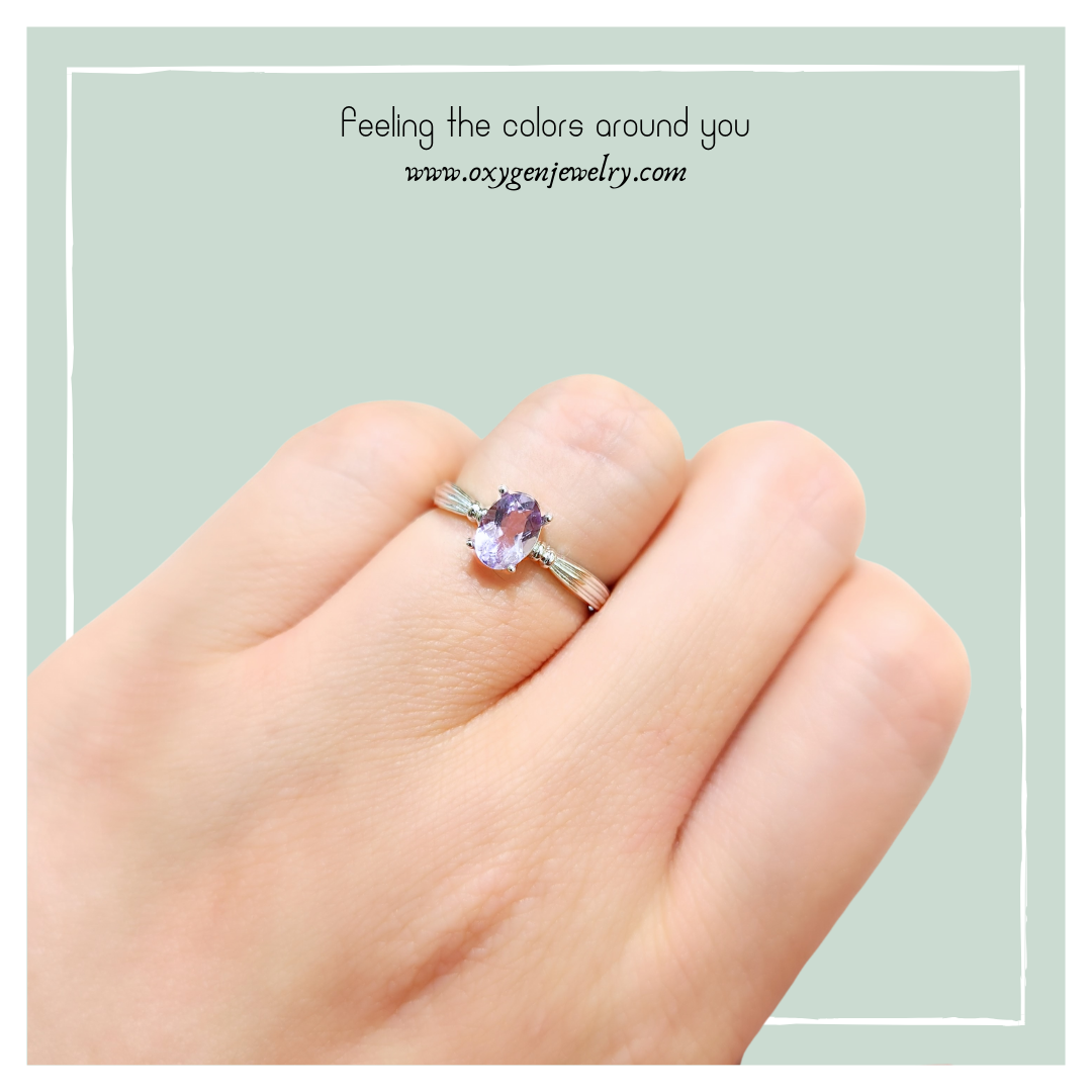 Oval Amethyst and Round Zirconia Ring