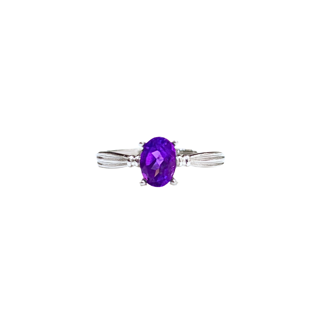 Oval Amethyst and Round Zirconia Ring