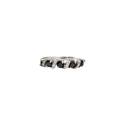 Oval black spinel and round zirconia ring