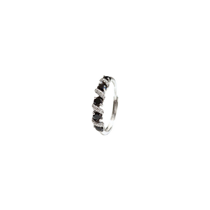 Oval black spinel and round zirconia ring