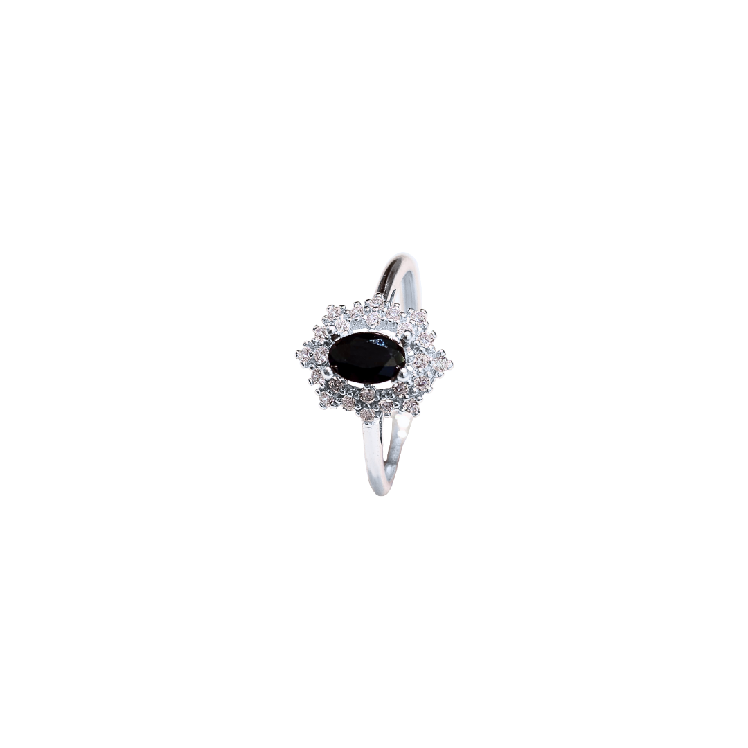 Oval black spinel and round zirconia ring