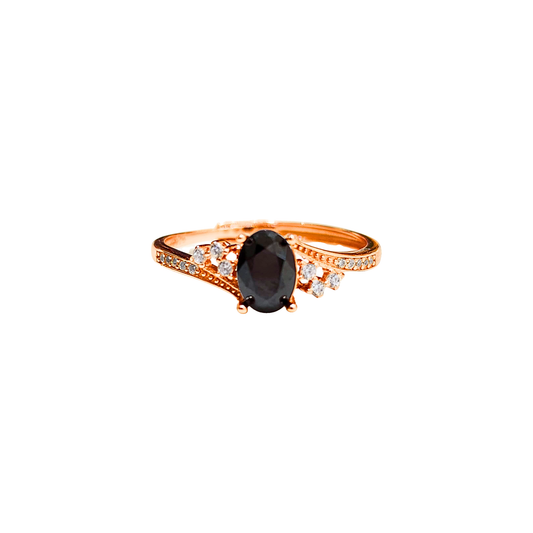 Oval black spinel and round zirconia ring